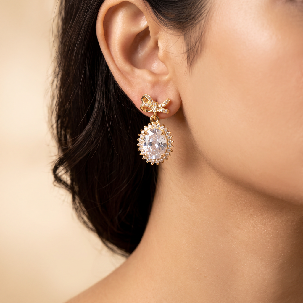 Gold Bow Pearl Stud Earrings