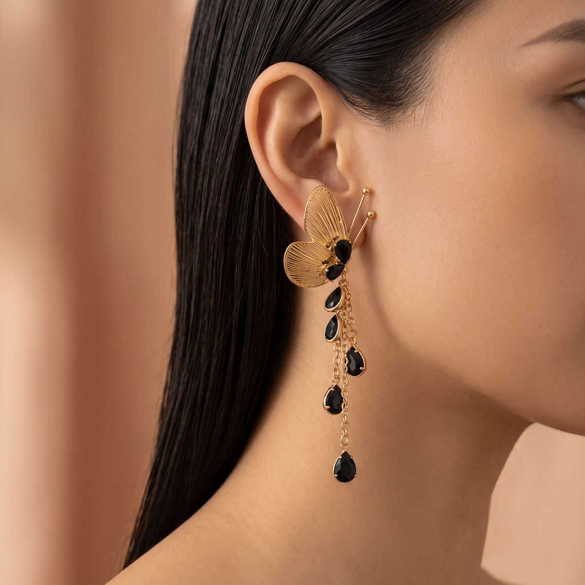 Gold Ribbed Butterfly and Black Teardrop Stone Earrings