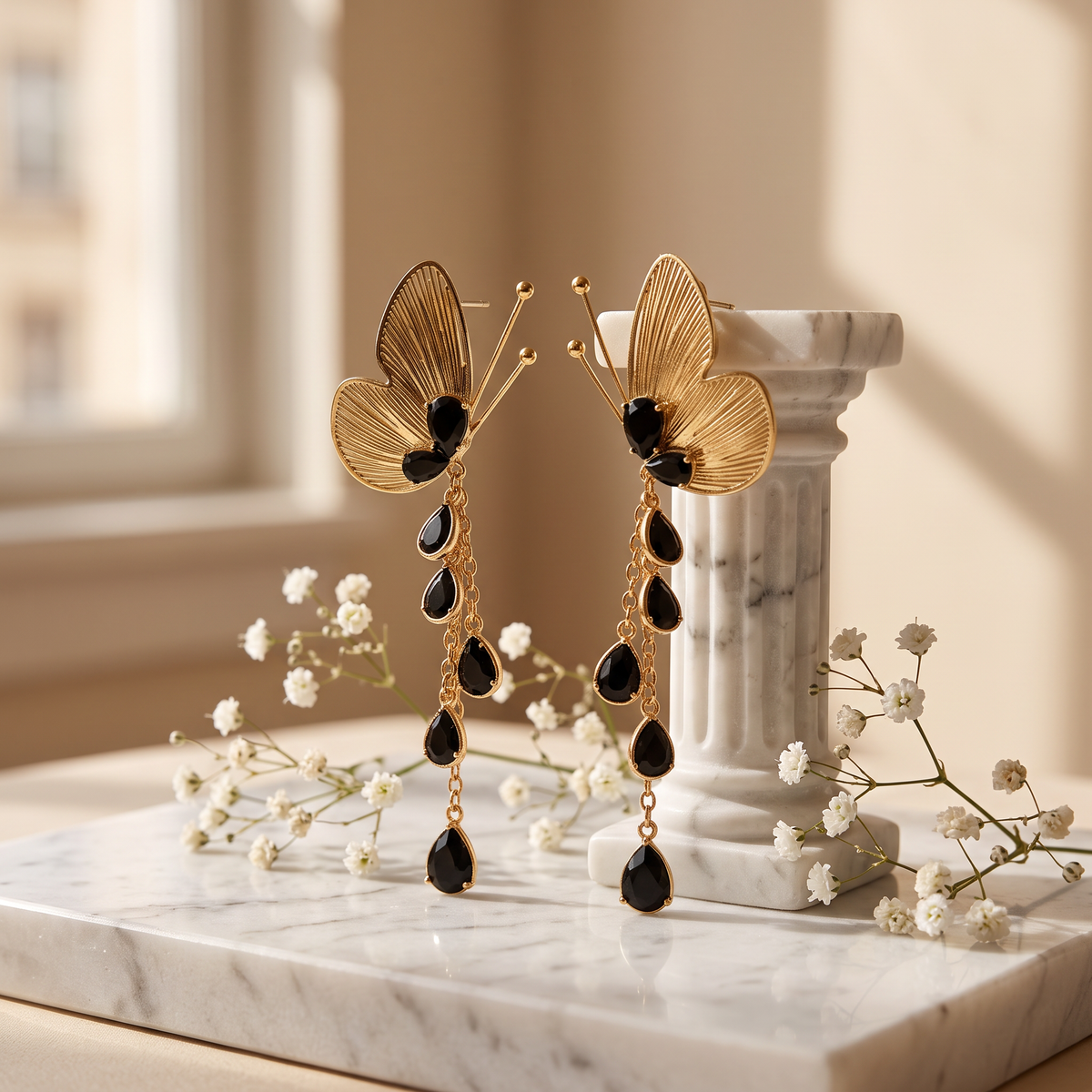 Gold Ribbed Butterfly and Black Teardrop Stone Earrings